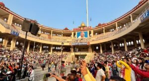 Indian side of Attari Wagah Border in Punjab, showing the stadium, seating area, chairs and visitors during the Wagah Border ceremony